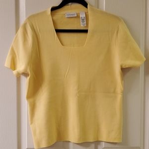 Bright yellow sweater